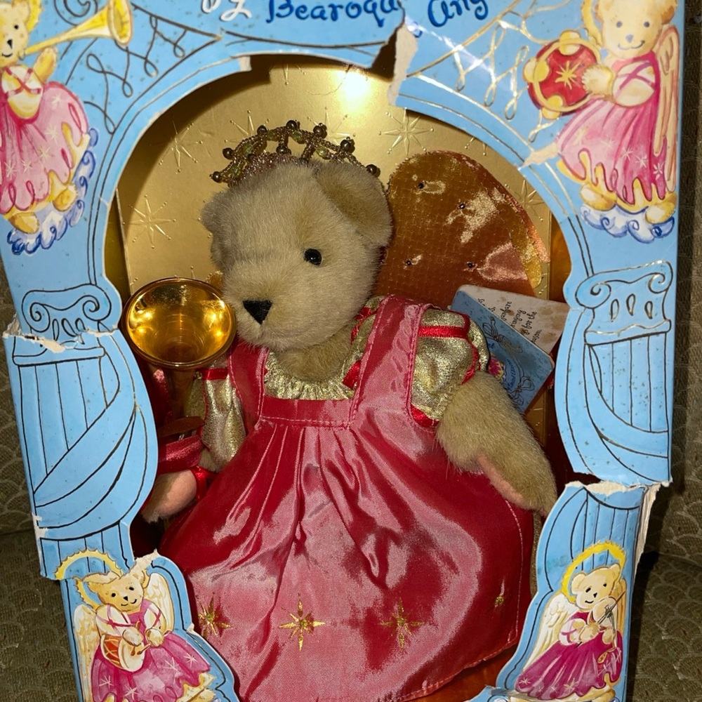 Muffy bearique angel new in box. Box is damaged.